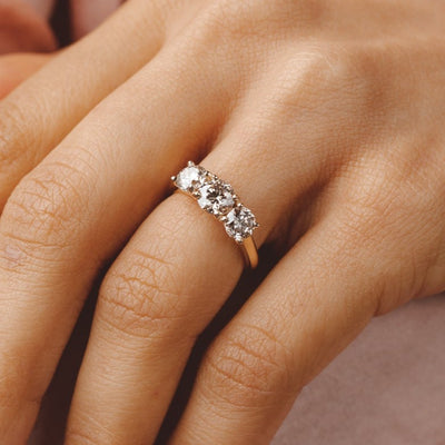 Round Trilogy Engagement Rings