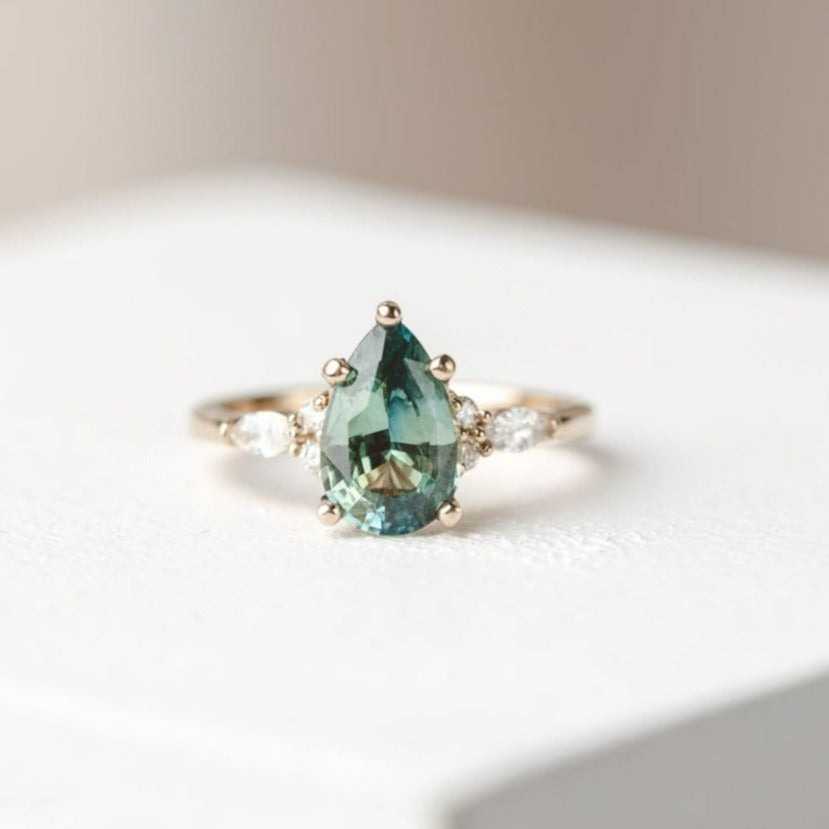 Teal Sapphire Engagement Rings